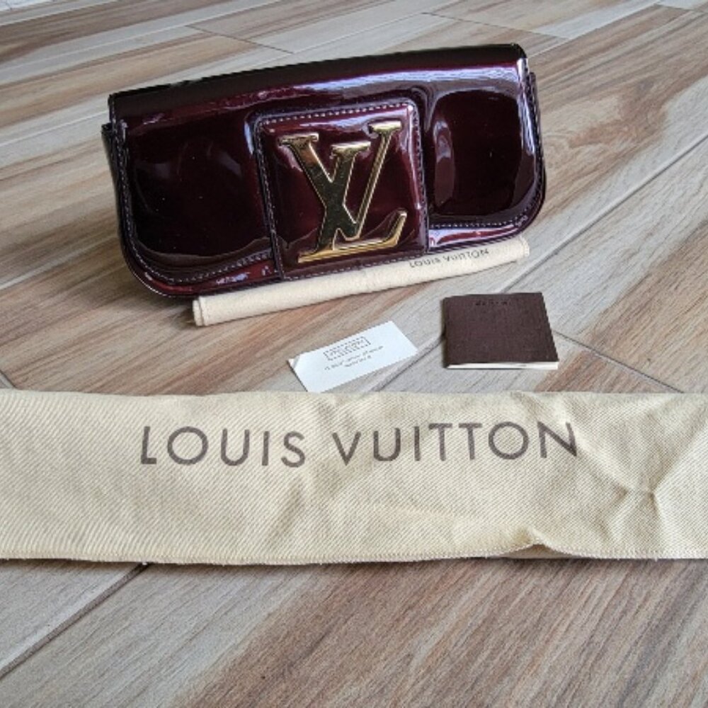 Louis Vuitton Amarante Sobe Clutch